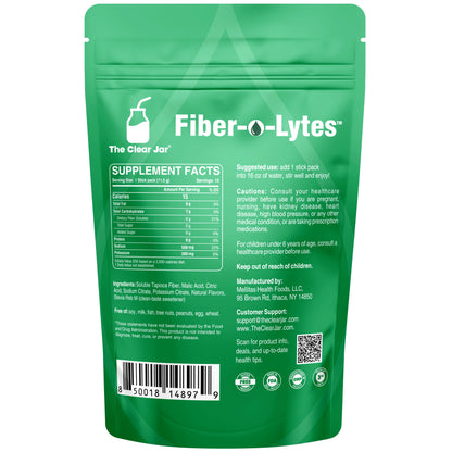 The back of a green Fiber-o-Lytes supplement pouch by The Clear Jar, showing supplement facts, ingredients, warnings, a barcode, and contact information on a white background.